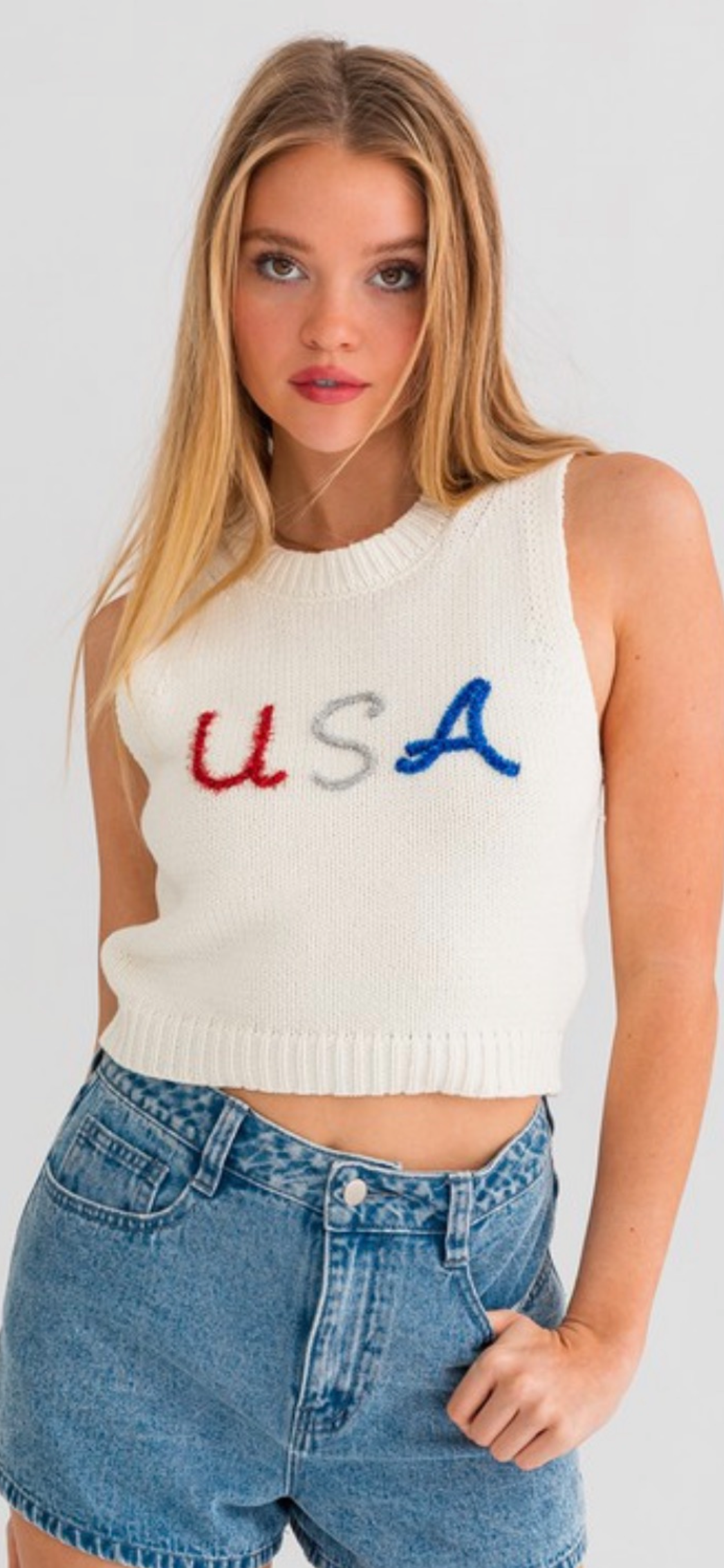 SLEEVELESS USA SWEATER