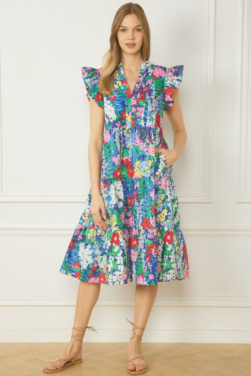 Floral print v-neck ruffle sleeve tiered mini dress. Pockets at side.